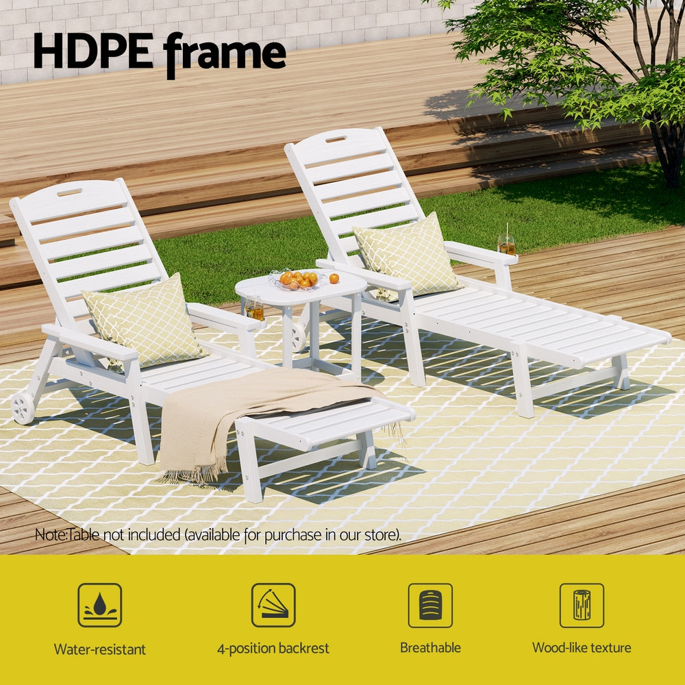 White outdoor lounge chairs with cushions on a patio, featuring HDPE frame text.