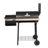 Side view of a black Grillz 2-in-1 offset charcoal smoker with a chrome-coated steel BBQ grill on top and a side firebox. It has a large front shelf, two wheels for mobility and set on a white background.