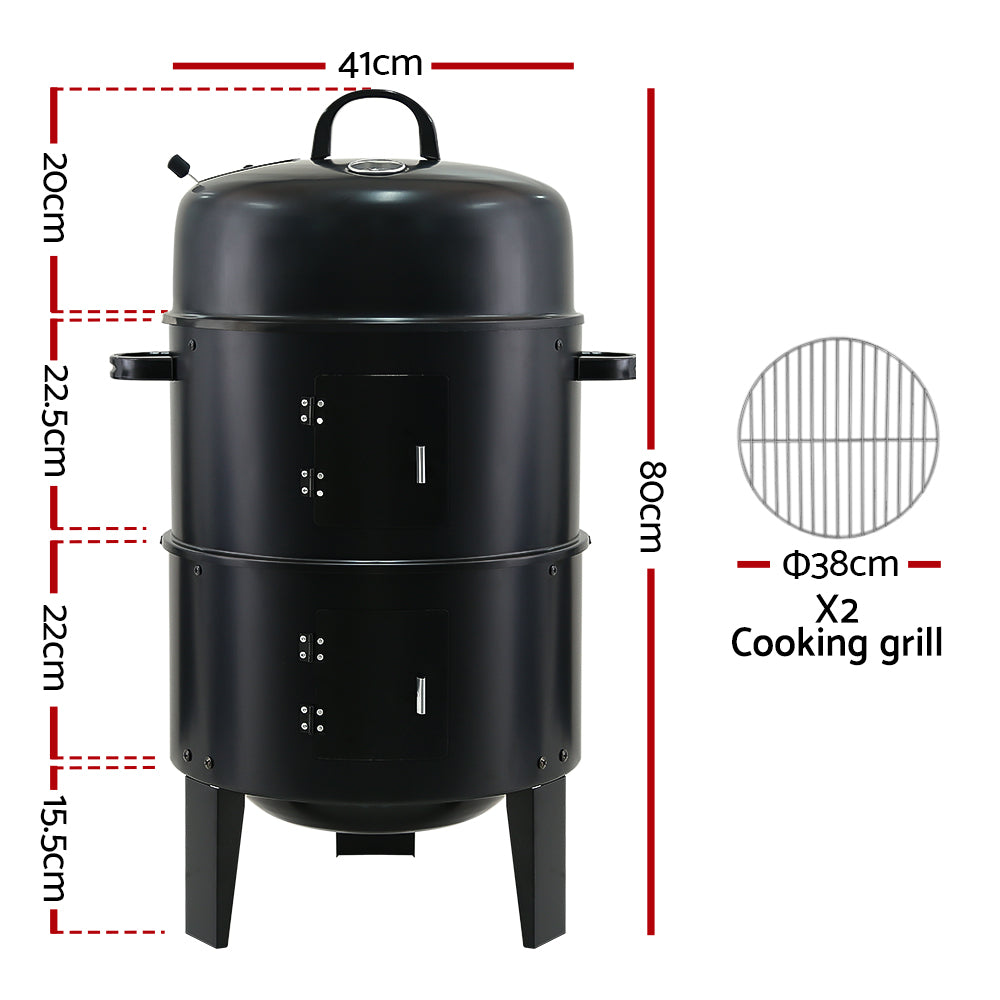 A black 3-in-1 charcoal BBQ smoker with a lid, side doors, and a front-mounted temperature gauge, showing its dimensions and set on a white background.
