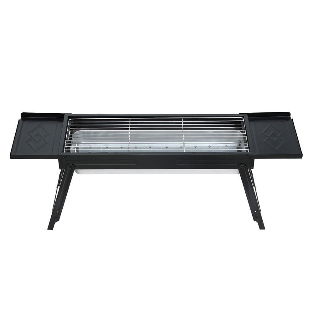 Black portable grill with a white background