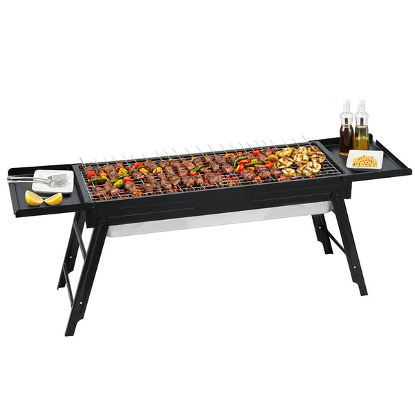 Portable grill with food on a white background