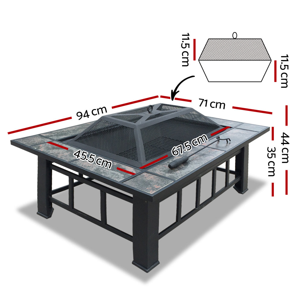 A 3-in-1 rectangular steel fire pit/BBQ grill outdoor table with grey tiles on the tabletop and a mesh dome on top with a poker showing its measurements and set in a white background.