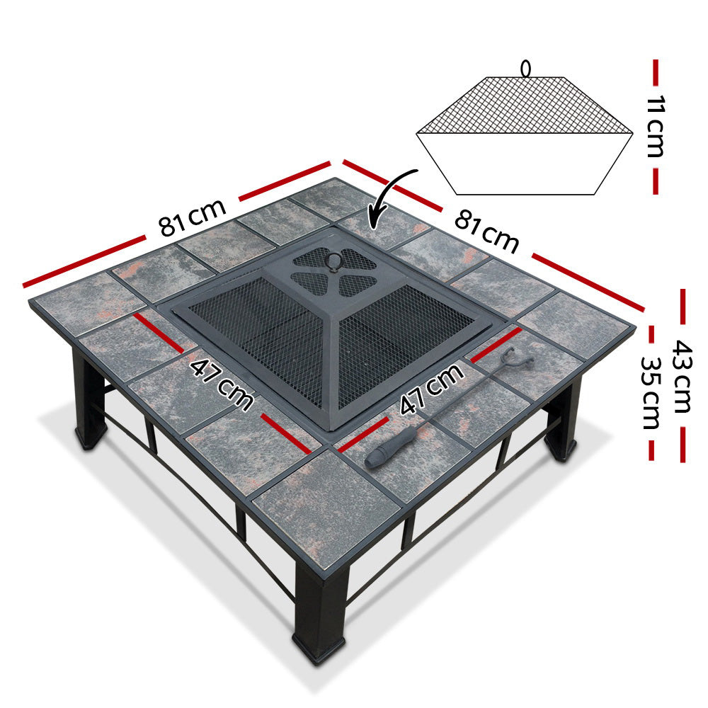 An outdoor fire pit BBQ grill with a grey finish, a mesh dome, ice tray, and a BBQ grilling rack on top, set on a black steel frame with ceramic tiles, showing its dimensions and set in a white background.