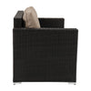 Black wicker armchair with a beige cushion on a white background