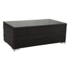 Rectangular coffee table with dark woven frame and glass top on a white background