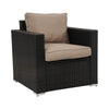 Brown wicker armchair with beige cushions on a white background