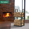 Fireplace with burning logs and a metal firewood rack against a stone wall.