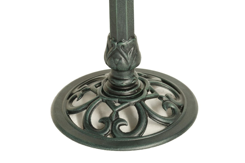 Decorative metal pedestal base on a white background