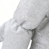 Close-up of textured gray fabric with a bow