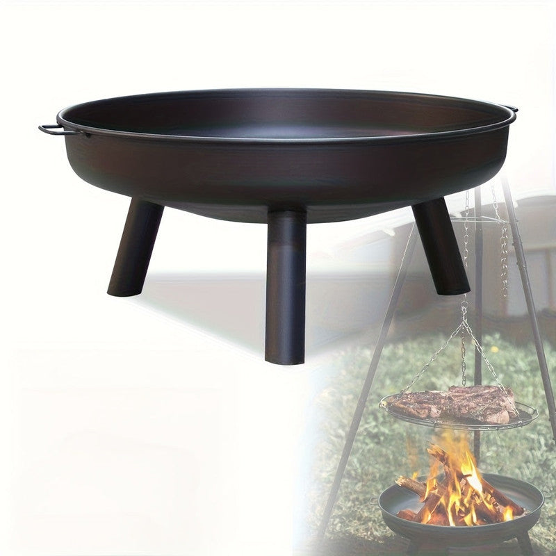 Black metal fire pit with a steaks grilling on a stand over flames