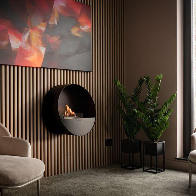 Modern living room with a wall-mounted fireplace, abstract art, and plants.