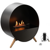 Modern black fireplace with wooden legs on a white background