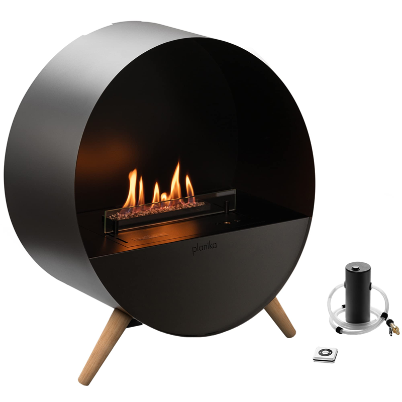 Modern black fireplace with wooden legs on a white background