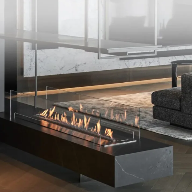 Modern fireplace with glass front in a living room setting