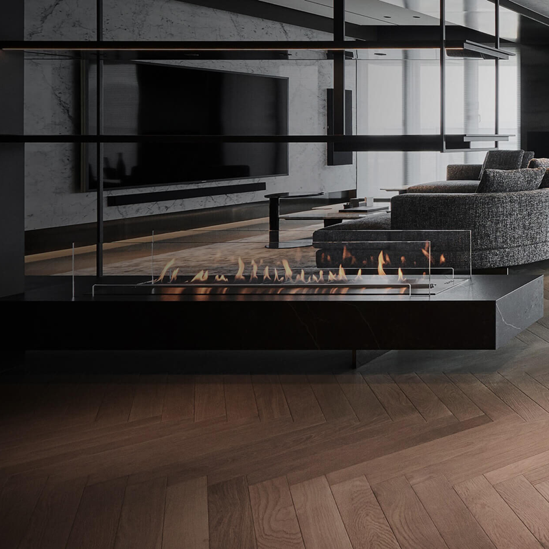 Modern living room with a large fireplace and reflective wall.