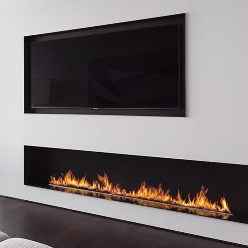 Modern electric fireplace with a flat-screen TV above it on a white wall.