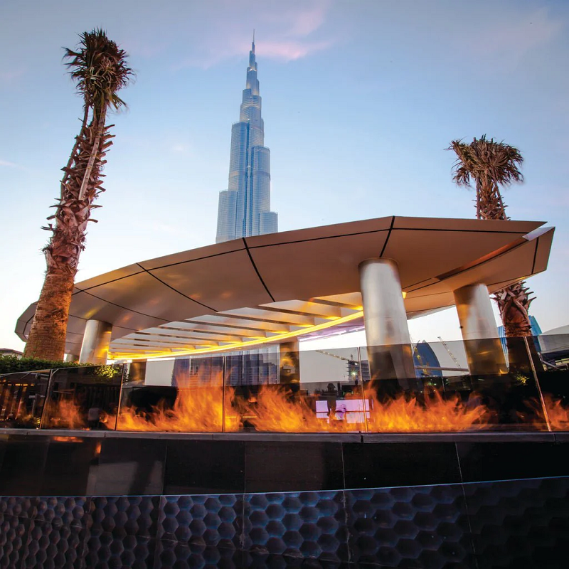 Beautiful fire burning at a  poolside - The Galio Gas Fire Pit Insert Linear Automatic