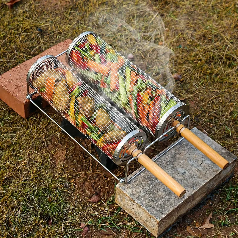 Metal mesh grill baskets with vegetables on a concrete block outdoors