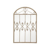 Decorative wall mirror with intricate metal frame on a white background