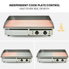 Electric cook plate with independent control knobs on a white background