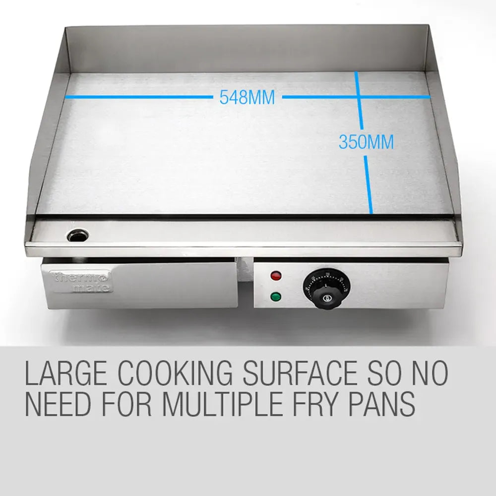 Stainless steel griddle with measurement details on a white background