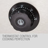 Thermostat control knob on a stove with text 'Thermostat control for cooking perfection'.