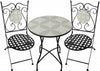 Wrought iron table and chairs with decorative patterns on a white background