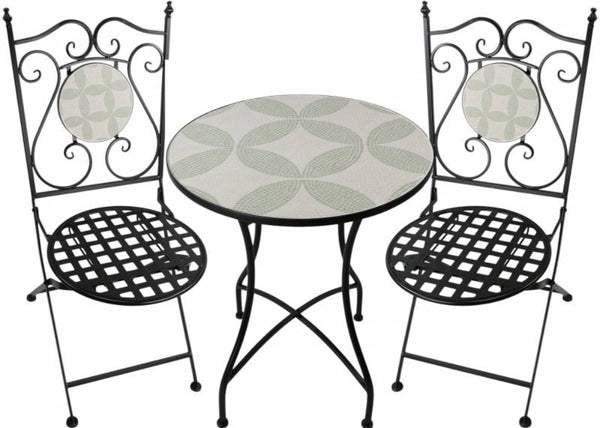 Wrought iron table and chairs with decorative patterns on a white background