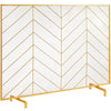 Gold-framed fireplace screen with chevron pattern on a white background