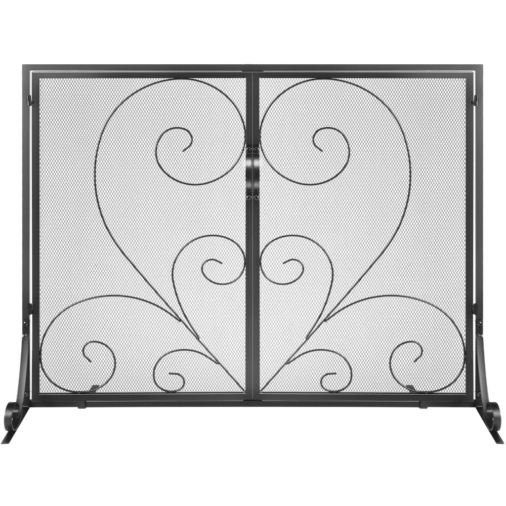 Decorative metal fireplace screen with intricate heart and swirl designs on a white background