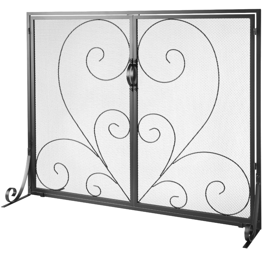Decorative metal fireplace screen with intricate heart and swirl designs on a white background