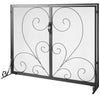 Decorative metal fireplace screen with intricate heart and swirl designs on a white background
