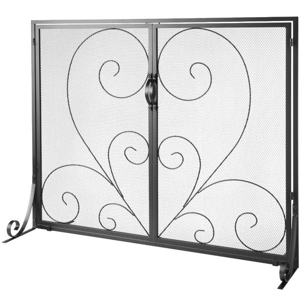 Decorative metal fireplace screen with intricate scroll design on a white background