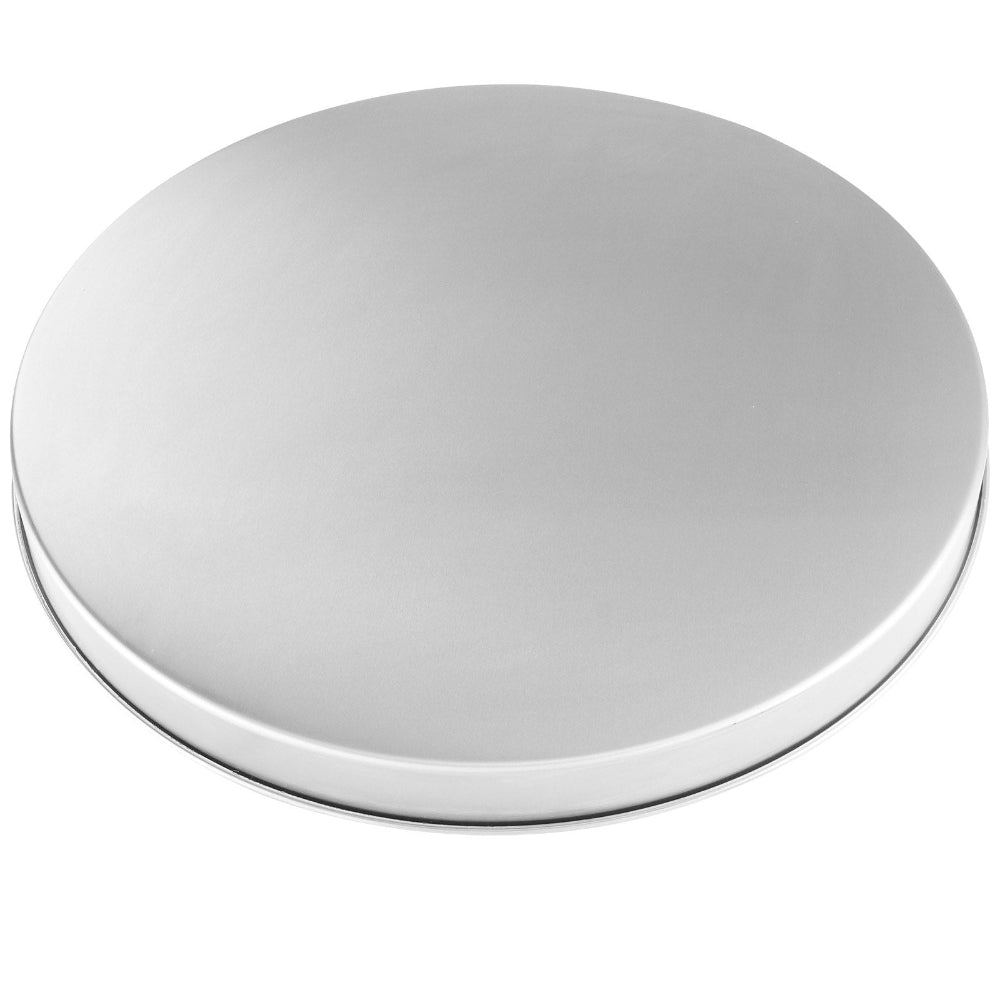 Round metallic fire pit cover on a white background