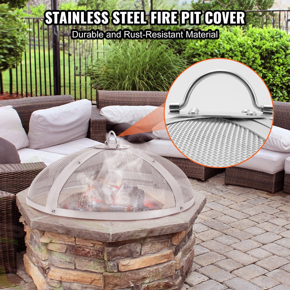 Stainless steel fire pit cover with stone base on patio, surrounded by outdoor furniture.