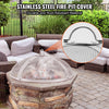 Stainless steel fire pit cover with stone base on patio, surrounded by outdoor furniture.
