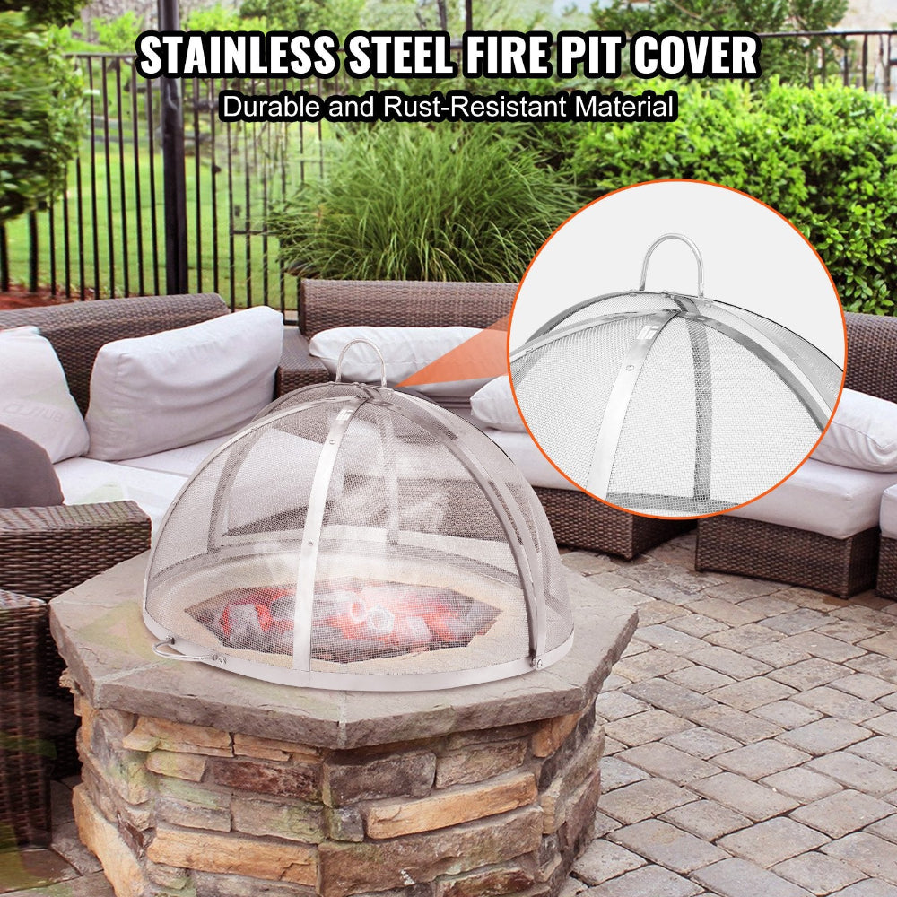 Stainless steel fire pit cover on a stone fire pit with outdoor furniture in the background.