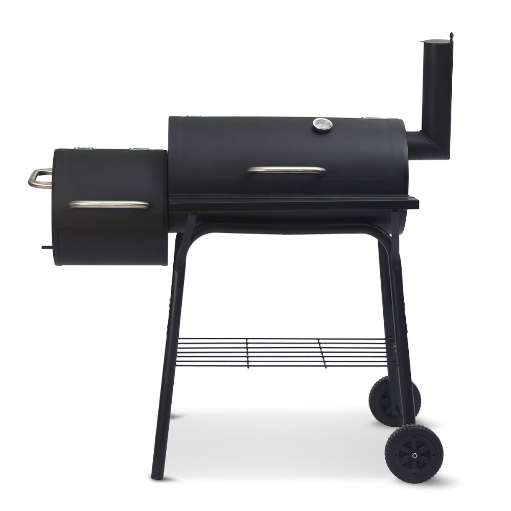 Black barbecue grill set on a white background