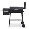 Black barbecue grill set on a white background