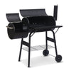 Black barbecue grill with wheels on a white background