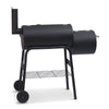 Black barrel-style barbecue grill on a white background