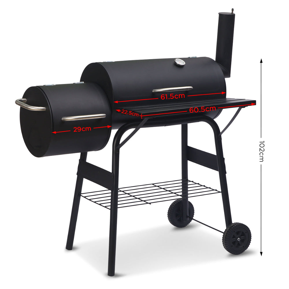 Black barbecue grill with measurements on a white background