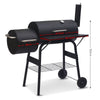 Black barbecue grill with measurements on a white background