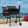 Black grill with a spacious shelf on a balcony with a cityscape view