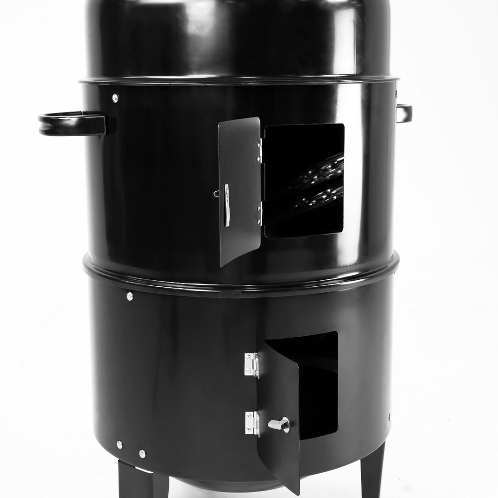 Black cylindrical barbecue grill on a white background.