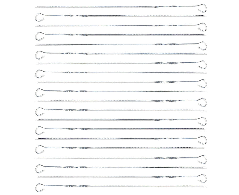 Multiple metal tent stakes arranged in rows on a white background