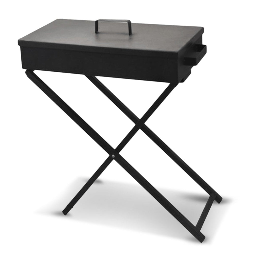 A portable charcoal grill with a black steel cover, chrome steel grill, and foldable legs on a stand and set on a white background.