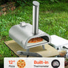 Portable pizza oven with a pizza inside, set outdoors on a grassy area.