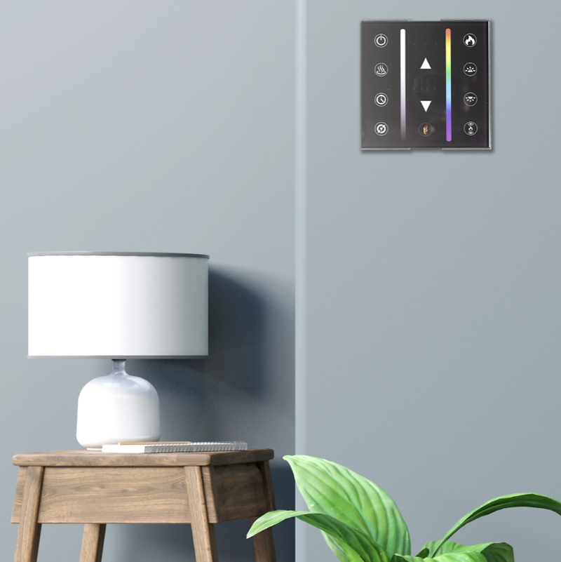 Astro Electric Fireplace Wall Switch on a grey painted wall, a table with lamp on and a pot plant in the room.