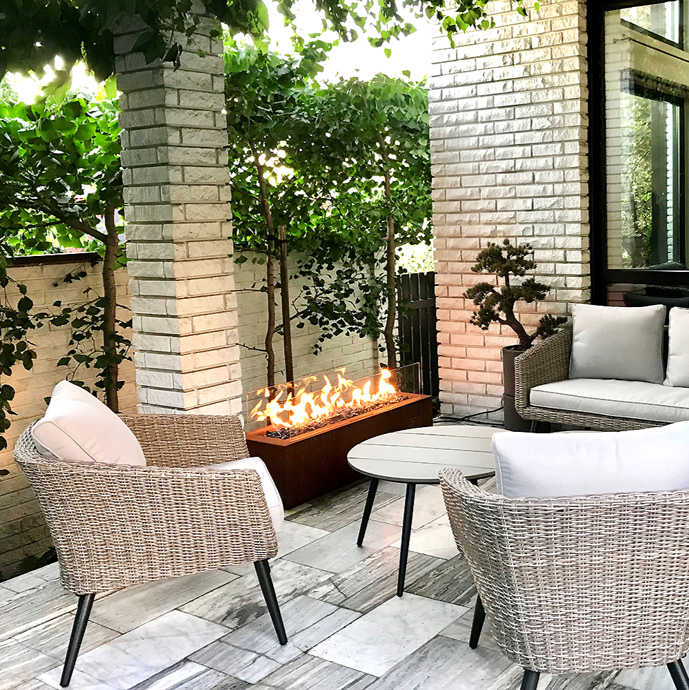 Private residence with Galio Linear Automatic Gas Fire Pit in Corten colour